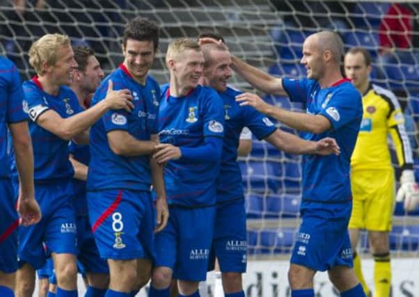 Billy McKay celebrates with his ICT team-mates after giving the home side a 2-0 lead. Picture: SNS