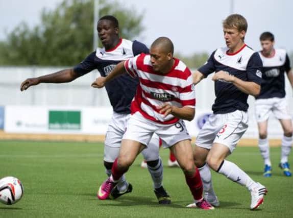 Hamilton scorer Mickael Antoine-Curier is shadowed by Falkirk's Ollie Durojaiye, left, and Stephen Kingsley. Picture: SNS
