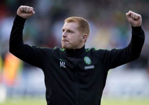 Neil Lennon had a few words to say about the state of the Tannadice pitch. Picture: SNS