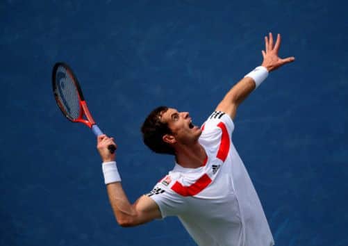 Andy Murray serves during his third round match against Florian Mayer. Picture: Getty