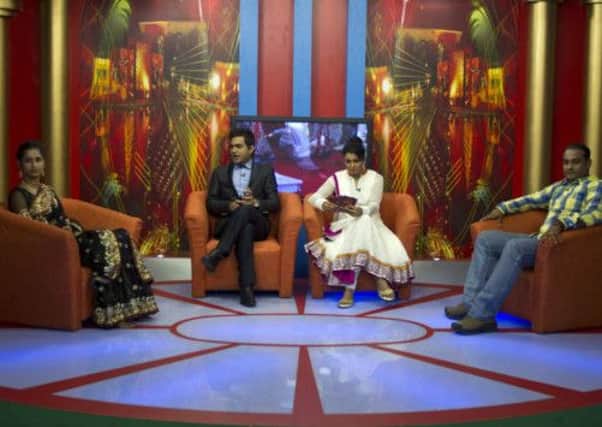 Nidhi Gaur and her fiance Rahul Rai participate in "So It's Final," a talk show on Shagun TV that features engaged couples in Noida, India. Picture: AP