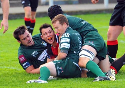 Patrick Boyer goes over for one of Hawks' first half tries. Picture: Robert Perry