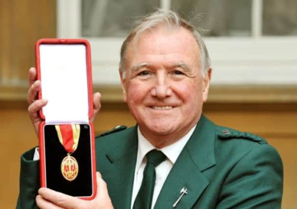 Sir Malcolm Bruce pictured in 2012 with his insignia of knighthood. Picture: PA