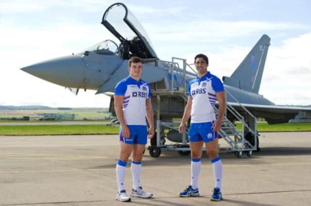 Kelly Brown and Matt Scott unveil the new kit at RAF Leuchars. Picture: SNS