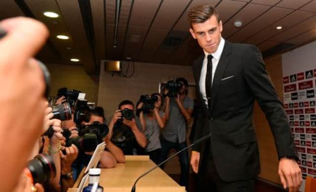 Gareth Bale arrives at the Bernabeu Stadium yesterday to be introduced to the media following his transfer to Real Madrid. Picture: AFP/Getty