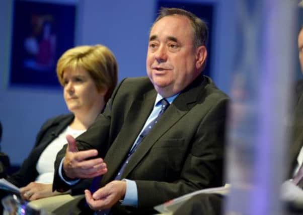 Alex Salmond, at a discussion yesterday, with his deputy Nicola Sturgeon. Picture: Phil Wilkinson