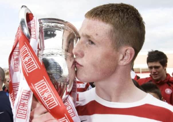 James McCarthy, celebrating the First Division title with Hamilton Accies in 2008, has come a long way in a short time. Picture: SNS