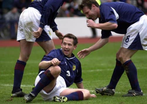 Billy Dodds celebrates his double v Belgium in 2001. Picture: Ian Rutherford