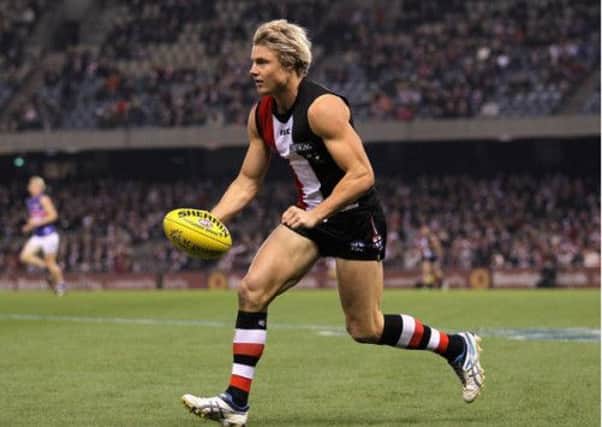 Clinton Jones, pictured in action for St Kilda Saints, has apologised for setting fire to a dwarf entertainer clothes. Picture: Getty