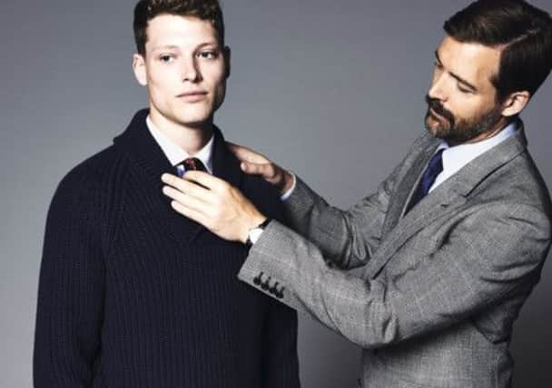Patrick Grant dresses a model in his Hammond and Co. collection. Picture: Contributed