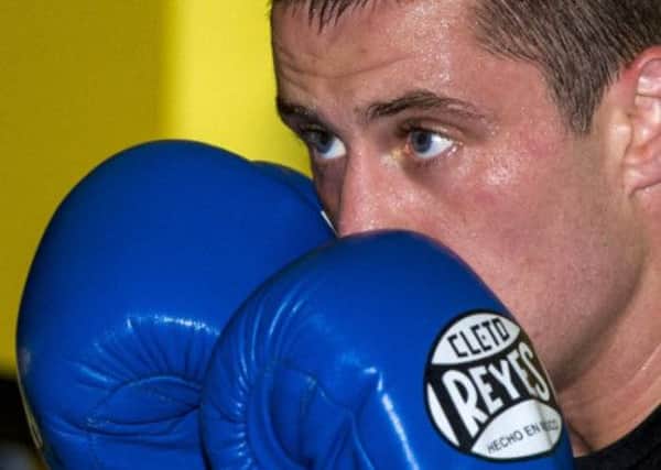 After moving house and becoming a father, Ricky Burns has his eyes firmly on his title defence. Picture: SNS