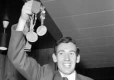 Jim Alder shows off his marathon gold and six miles bronze. Picture: Allan Milligan