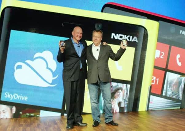 Microsoft chief executive Steve Balmer, left, and Nokias Stephen Elop unveiled the Microsoft powered handset last year. Picture: Getty