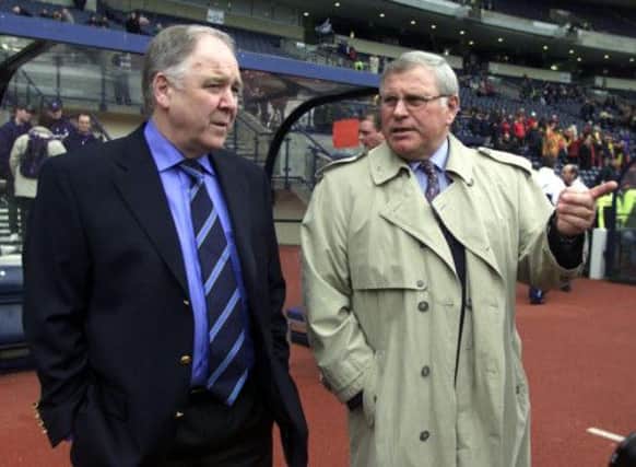 Opposing managers Craig Brown and Robert Waseige exchange views. Picture: SNS