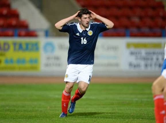 Dejection for Scotland's Lewis Kidd after missing a chance. Picture: SNS