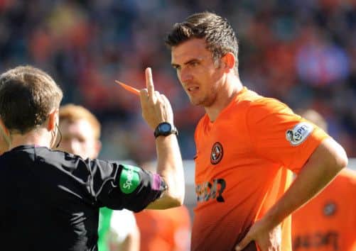 Gavin Gunning was red carded last month for violent conduct after clashing with Hibernian's Kevin Thomson. Picture: Ian Rutherford
