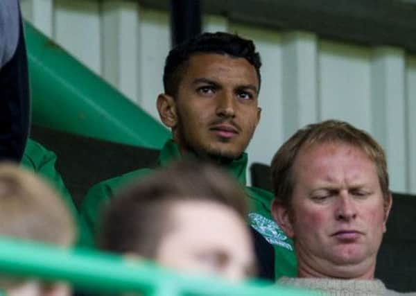 New Hibernian signing Abdellah Zoubir watches from the stand. Picture: SNS