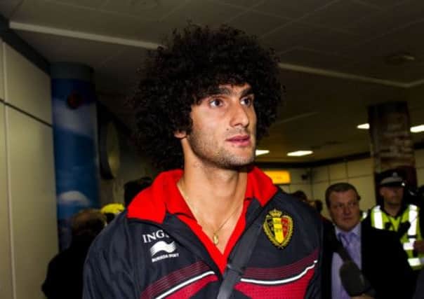 Belgian superstar Marouane Fellaini arrives in Glasgow ahead of his side's clash with Scotland. Picture: SNS