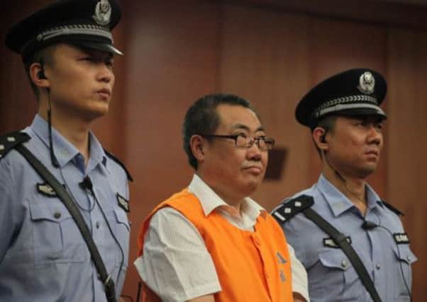 Yang Dacai, a former provincial official, listens to the verdict at a court in Xi'an, Shaanxi province. Picture: Reuters