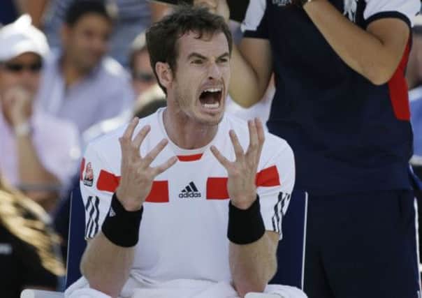 The Wimbledon champion struggles to contain himself during his straight sets loss to Stanislas Wawrinka. Picture: AP
