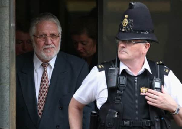 Dave Lee Travis, whose real name is David Patrick Griffin, leaves the Old Bailey court this morning. Picture: Getty