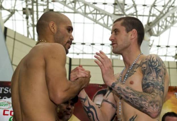 Defending WBO champion Ricky Burns shares a friendly handshake with Raymundo Beltran at yesterday's weigh-in.  Picture: SNS