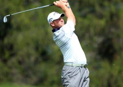 Brush with history: Craig Lee narrowly misses a first sub-60 round. Picture: Getty