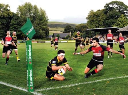 Melrose winger Damien Hoyland scores the winning try against Glasgow Hawks yesterday. Picture: Ian Rutherford