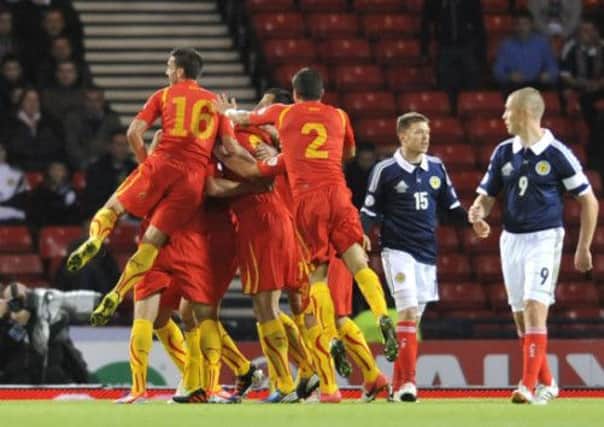 Macedonia celebrate a goal during their clash with Scotland earlier in the campaign. Picture: Robert Perry