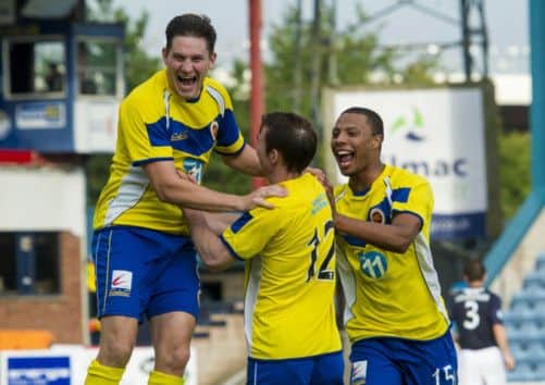 Stenhousemuir players celebrate their victory on penalties. Picture: SNS