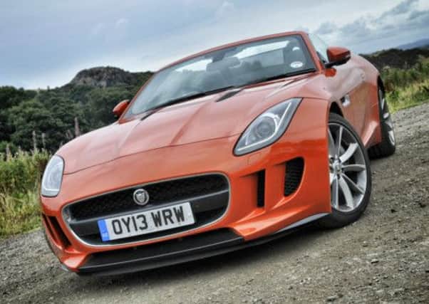 With the roof down, 
the Jaguar F-Types snug cockpit becomes a plush theatre built for two