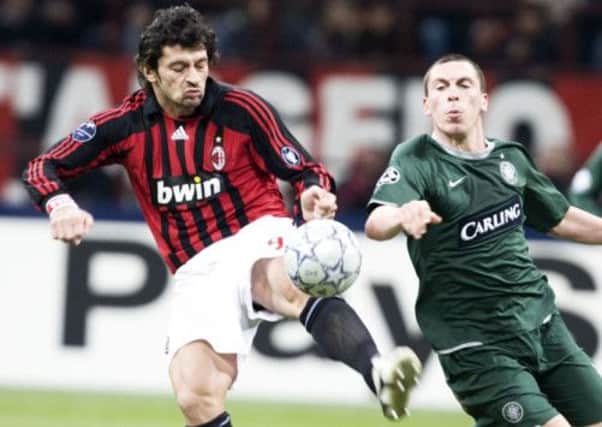 Scott Brown battles AC Milan's Favalli Guiseppe during the side's last meeting in 2007. Picture: SNS