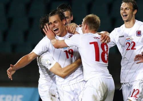 Luxembourg's Mathias Janisch celebrates his winning goal. Picture: Reuters