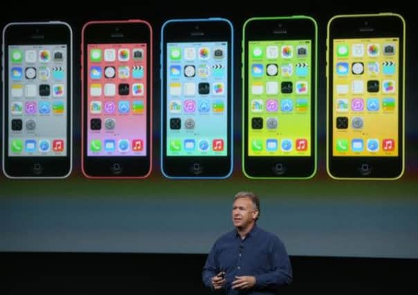 Apple's Phil Schiller unveils the iPhone 5C in Cupertino, California. Picture: Getty
