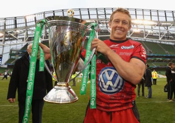 Jonny Wilkinson, the Toulon captain and former England fly-half, holds the Heineken Cup trophy after the 2013 final. Picture: Getty