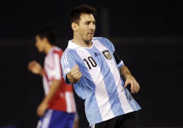 Argentina's Lionel Messi celebrates heping his country to the 2014 World Cup finals. Picture: Reuters