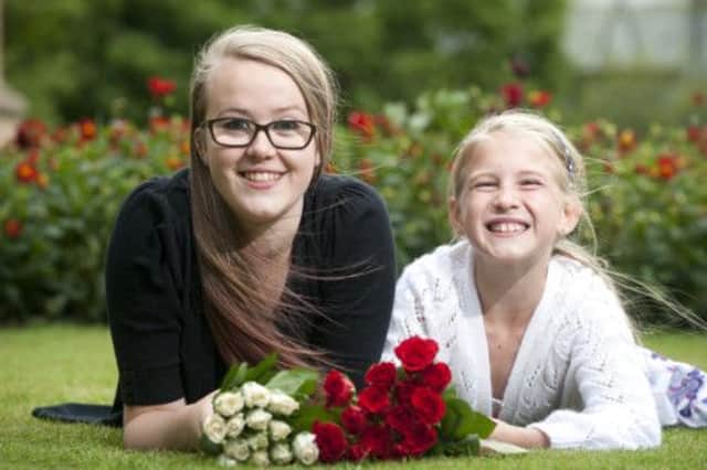 Leigh Bonthrone, 15, and Jemma Findlay, 8, have been picked to present flowers to Her Majesty Sonja, Queen of Norway. Picture: submitted