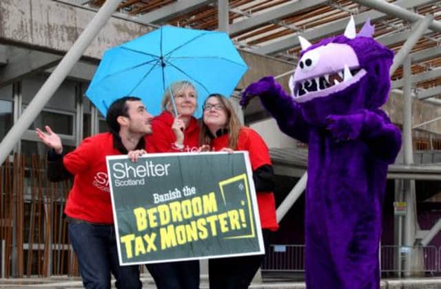 Charity workers from Shelter Scotland protest outside Holyrood against the Bedroom Tax. Picture: Hemedia