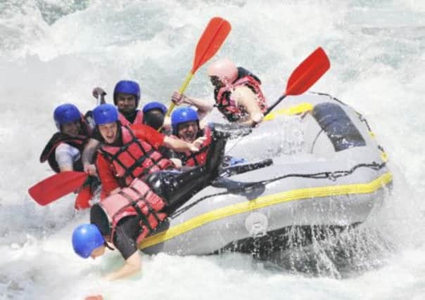 With a good guide on board, white water rafting is much safer than it at first appears