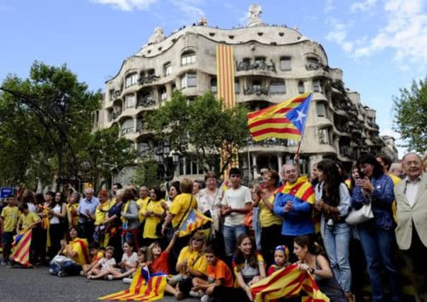 Catalans independence supporters in front of the Pedrera in Barcelona. Picture: Getty
