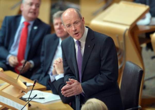 John Swinney delivers his treasury budget speech at Holyrood. Picture: Phil Wilkinson