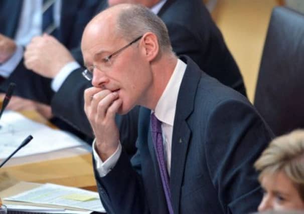 John Swinney at Holyrood. Picture: Phil Wilkinson