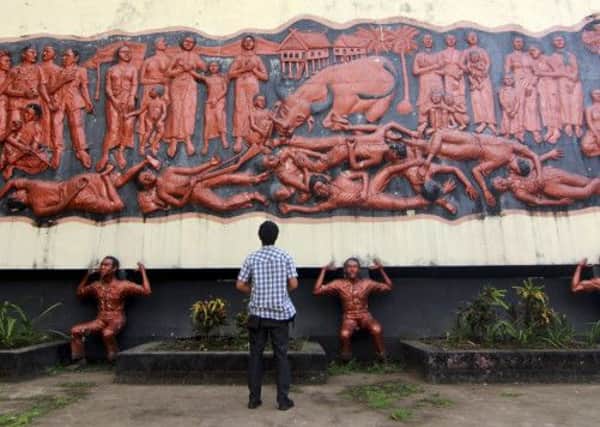 The victims of the 1946-7 massacres by Dutch troops are remembered by a relief in Makassar. Picture: AP