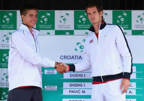 Andy Murray shakes hands with 16yearold Borna Coric in Umag yesterday. The pair will face each other in the Davis Cup today. Picture: Getty