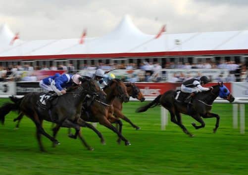 Paul Mulrennan drives 100-1 shot Morning Post, right, to a narrow victory as Kevin Ryans colt caused a major upset in The Weatherbys Hamilton Insurance Stakes at Doncaster yesterday