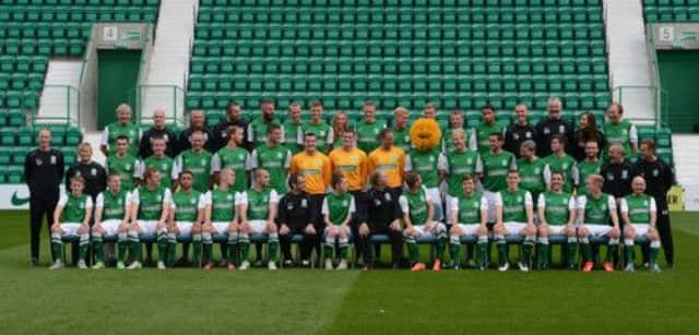 Hibs defender Michael Nelson plays it for laughs as he dons a furry face during a team picture with supporters yesterday. Picture: Neil Hanna