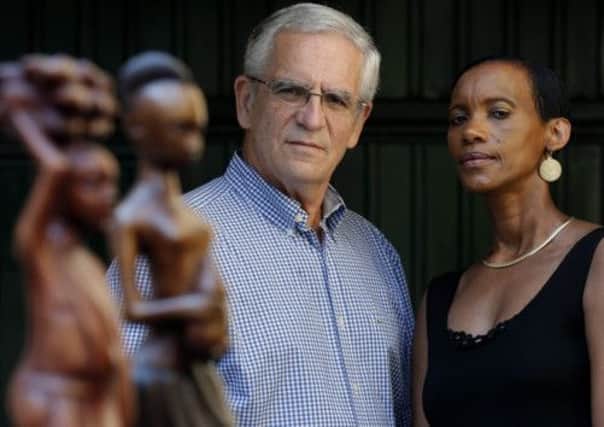 Alain and Dafroza Gauthier have devoted a decade to tracking down dozens of suspected accomplices of the Rwandan genocide. Picture: Reuters
