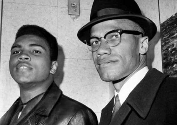 History man: Muhammad Ali with Malcolm X in New York in 1964, around the time he joined the Nation of Islam. Photographs: New York Daily News and Getty