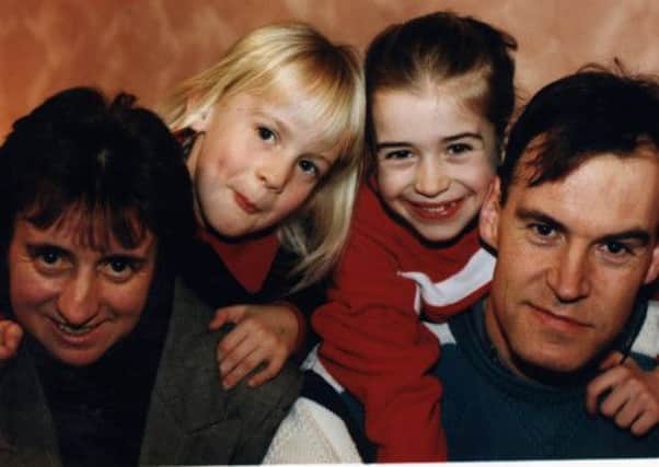 Lynsey Sharp, second left, poses for a childhood photo with her mum Carol, sister Carly and dad Cameron