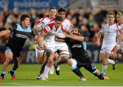 Glasgows Josh Strauss, left, and DTH van der Merwe combine to halt Ulsters David MacIlwaine last night. Picture: Sportsfile